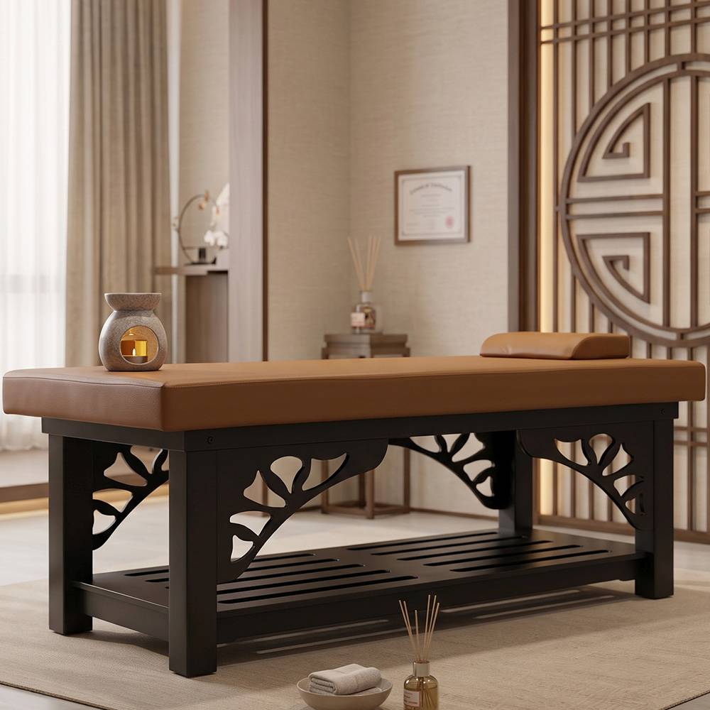 Stationary wooden Thai massage table in an authentic Asian studio setting